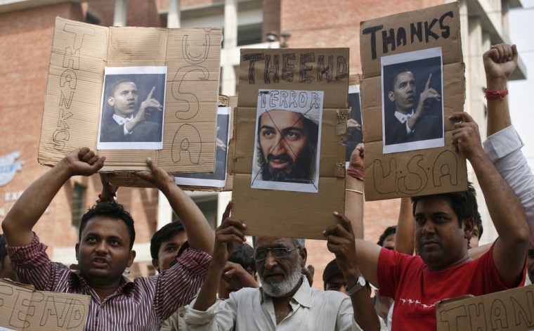 Members of the All India Anti-Terrorist Front hold portraits of President Barack Obama and Osama bin Laden during a pro-U.S. rally as they celebrate the al Qaeda leader's death at Noida, India, on May 5, 2011.