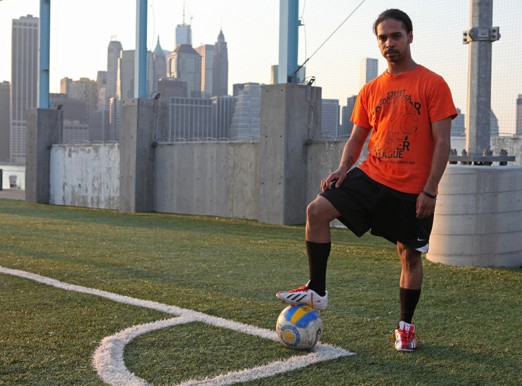 Dennis Diaz poses after a Street Soccer fame in Brooklyn Bridge Park on July 17 in New York City.