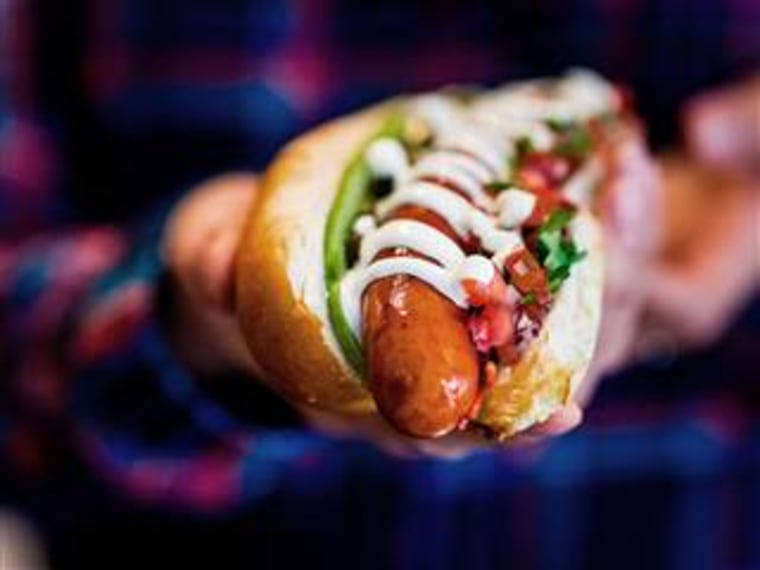 Bubbledogs, a new restaurant in London offers the humble hotdog paired with Champagne. It's part of a trend in the city for upmarket fast food