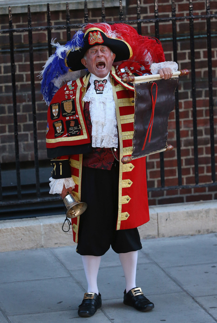 A town crier announces the birth of the son of The Duke and Duchess of Cambridge.