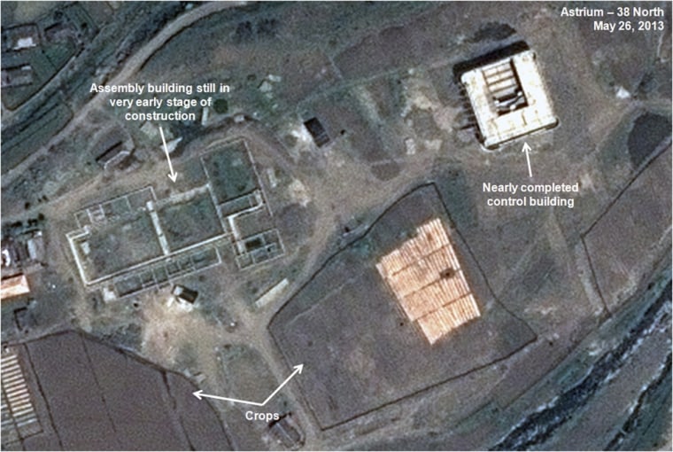 This May 26, 2013 satellite image shows an unfinished new missile assembly building, top left, and control center, top right, at the Tonghae facility in North Korea.