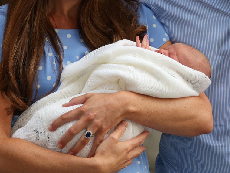 Image: Newborn royal baby in Duchess Kate's arms