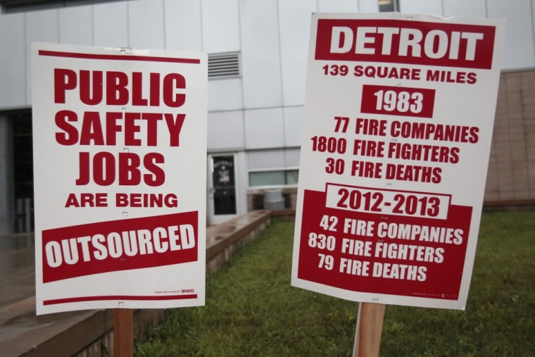 Informational signs are seen in front of a southwest Detroit neighborhood Fire House placed there by Detroit firefighters to inform the public about t...