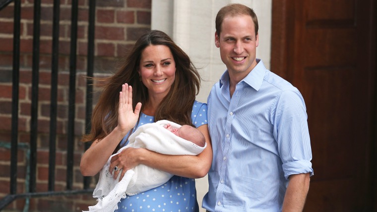 And now there are three: The Duke and Duchess of Cambridge show the world their day-old prince.