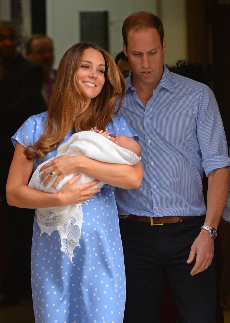 Prince William and Catherine, Duchess of Cambridge show their new-born baby boy to the world's media, standing on the steps outside the Lindo Wing of ...