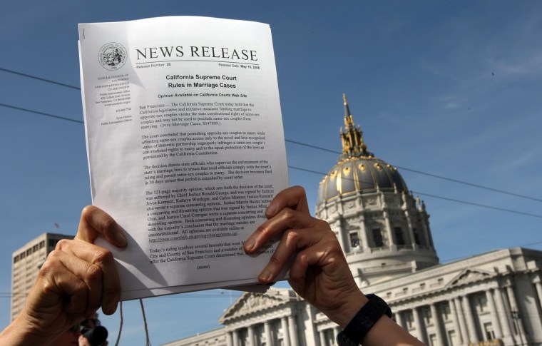 A woman holds a copy of the news release announcing the California Supreme Courts decision to overturn the ban on same-sex marriage May 15, 2008 at the California Supreme Court in San Francisco.