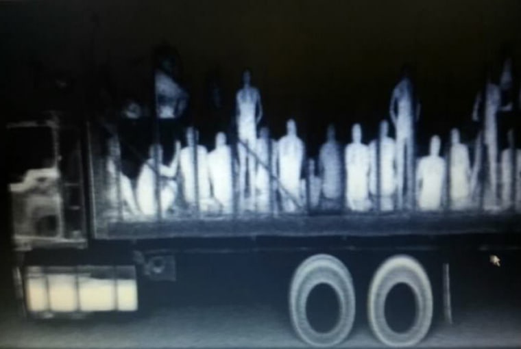 An x-ray image shows how 94 illegal migrants in a truck were discovered by authorities in Tuxla Gutierrez, Mexico, on July 23, 2013. The 78 men and 16 women were traveling in inhumane conditions and have serious injuries to their hands and legs, as well as symptoms of suffocation.