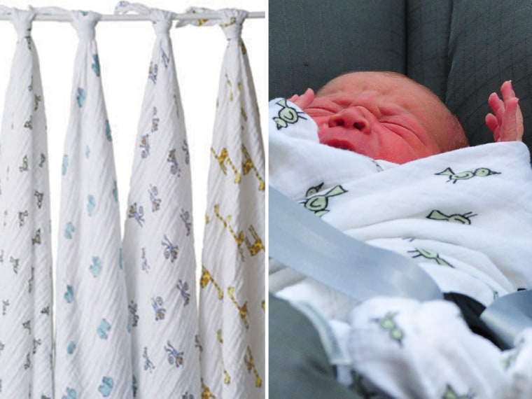 The new prince was wrapped in the \"jungle jam swaddle\" from Aden + Anais.