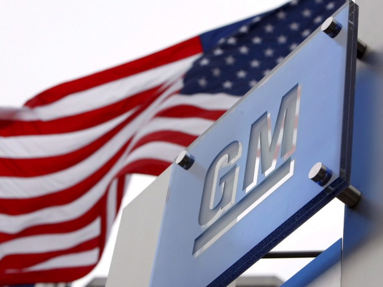 epa03732259 (FILE) A file picture dated 19 November 2008 shows flags fly outside of General Motors World Headquarters in the Renaissance Center in Det...