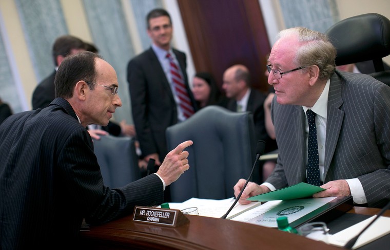 Adam Goldstein, president and CEO of Royal Caribbean International, talks with committee chairman Sen. John Rockefeller after testifying before the Senate Commerce, Science and Transportation Committee July 24, 2013 in Washington, DC.