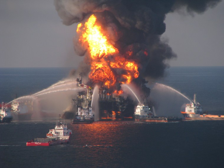 Fire boat response crews battle the blazing remnants of the offshore oil rig Deepwater Horizon, off Louisiana, in this handout photograph taken on April 21, 2010.