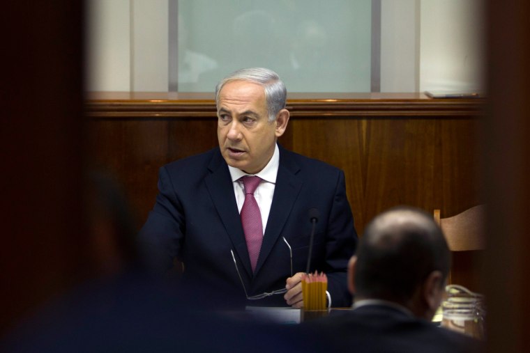 Israel's Prime Minister Benjamin Netanyahu attends the weekly cabinet meeting in Jerusalem July 28, 2013. Netanyahu on Sunday urged divided rightists in his cabinet to approve the release of 104 Arab prisoners in order to restart peace talk with the Palestinians.