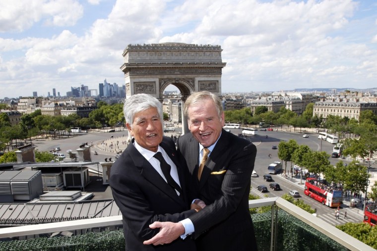 Maurice Levy, left, Chief Executive of French advertising group Publicis, and John Wren, head of Omnicom Group pose during a joint news conference in ...