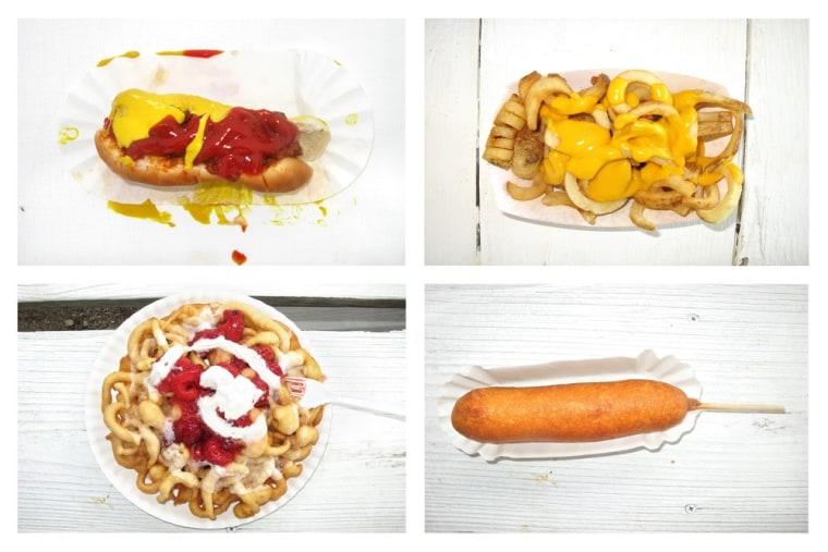 A combo image made from four separate photographs shows carnival food that fairgoers purchased at the Delaware County Fair in Manchester on July 11. They are (clockwise from upper left): a hot dog with ketchup and mustard, curly fries with cheese, a fried corn dog, and a funnel cake with strawberry topping and whip cream.