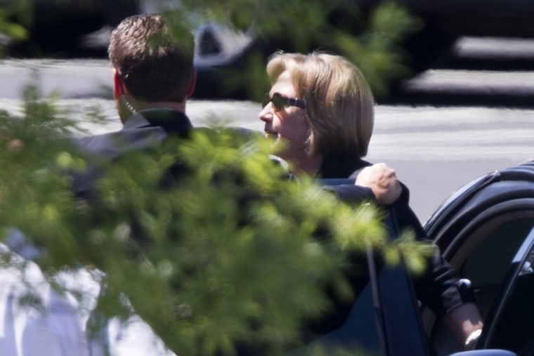Former Secretary of State Hillary Rodham Clinton arrives at the White House in Washington, Monday, July 29, 2013, for lunch with President Barack Obama.
