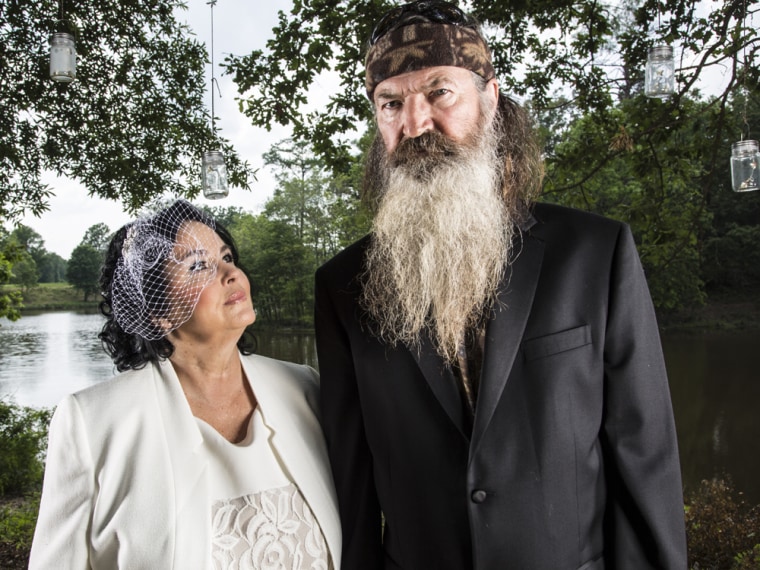 Miss Kay and Phil Robertson in A&E's 'Duck Dynasty' returning for season 4 August 14 at 10PM ET/PT.