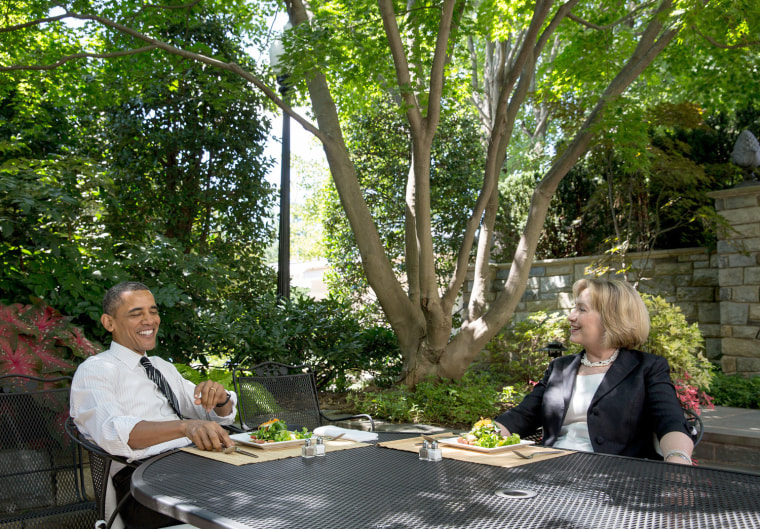 President Barack Obama has lunch with former Secretary of State Hillary Clinton on the patio outside the Oval Office, July 29, 2013.
