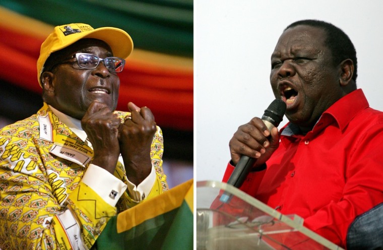Zimbabwe's President Robert Mugabe, left, and Prime Minister Morgan Tsvangirai are thought to be running neck-and-neck ahead of presidential elections Wednesday. Tsvangirai has warned Mugabe not to