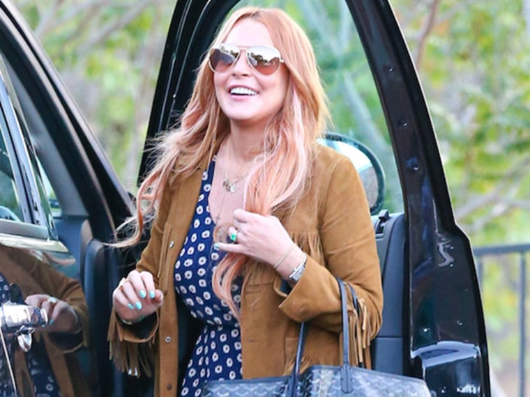Malibu, CA - Lindsay Lohan says her last goodbyes with in-house patients at the Cliffside Malibu Rehab Center where she was just released.  Lindsay sm...