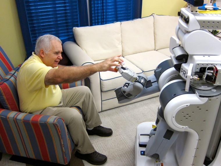 Georgia Tech researchers asked elderly adults how they felt about robots like PR2 fetching and handing over medicine bottles.