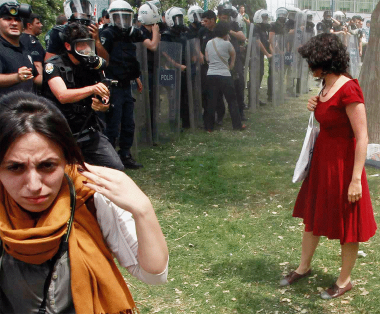A sequence of photos shows riot police using tear gas against an unidentified woman in Istanbul's Taksim Square on May 28.