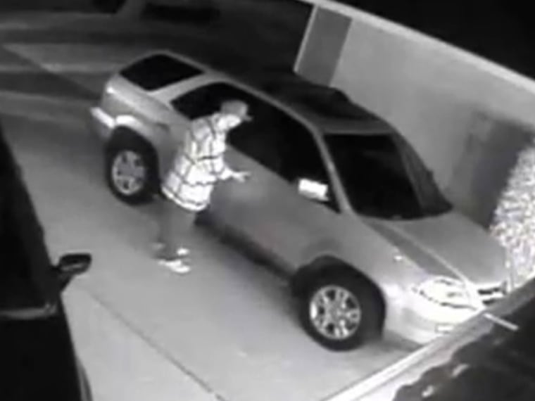 Thief uses mystery gadget to enter car.