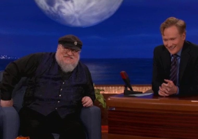 George R.R. Martin has a laugh with Conan O'Brien as they watch fan reactions to the infamous Red Wedding scene from "Game of Thrones."