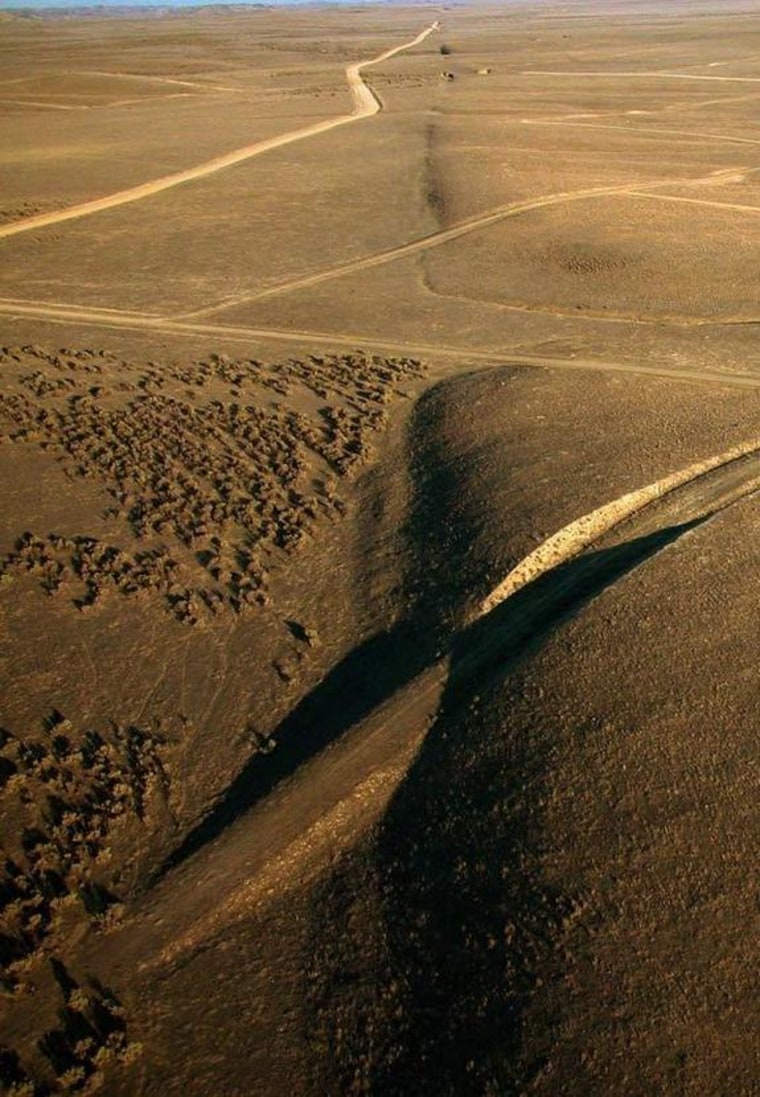 The view looking southeast along the surface trace of the San Andreas Fault in the Carrizo Plain, north of Wallace Creek. Elkhorn Road meets the fault near the top of the photo.