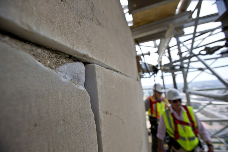 Stone by stone, engineers repair damaged Washington Monument
