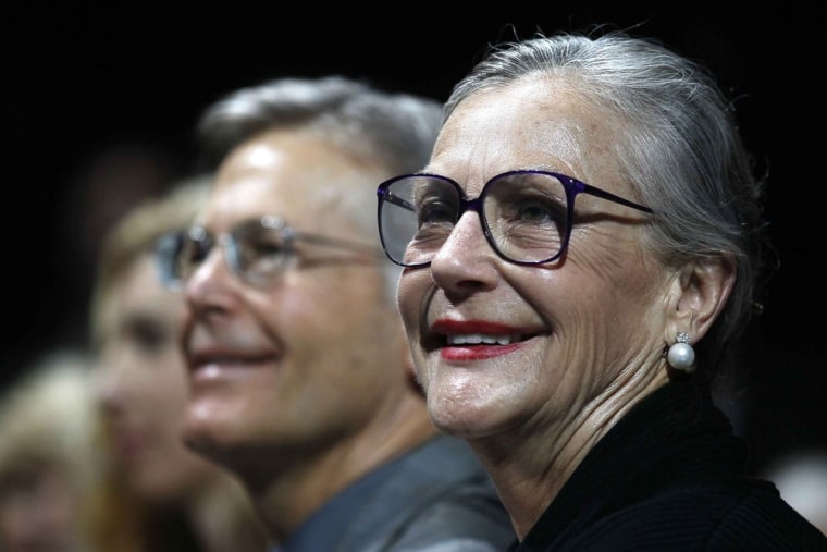 Wal-Mart Stores family members Jim Walton (L) and Alice Walton are introduced at the annual shareholders meeting for Wal-Mart in Fayetteville, Arkansa...