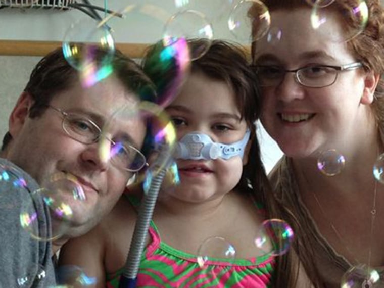 Sarah Murnaghan, 10, shown with her parents Janet and Francis Murnaghan, has cystic fibrosis and needs a lung transplant. A judge last week ruled that she could be more easily considered for adult lungs.