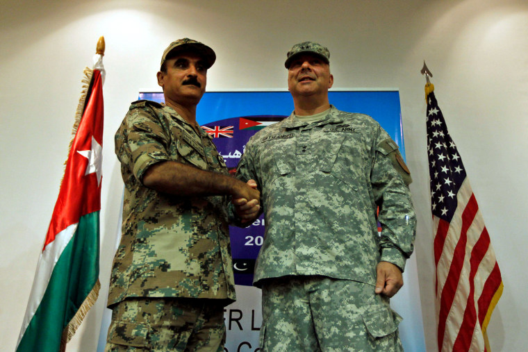 U.S. Army Maj. Gen. Robert Catalanotti, director of Exercises and Training Directorate J-7 for U.S. Central Command, shakes hands Sunday with Maj. Gen. Awni el-Edwan, Chief of Staff of the Jordanian Operations and Training Armed Forces.