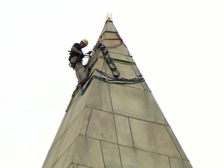 To gain access, workers take a 491-foot ride on a hoist.