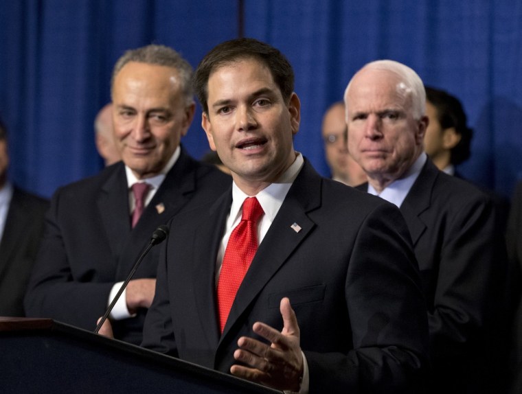 Sen. Marco Rubio, R-Fla., flanked by Sen. Charles Schumer, D-N.Y., left, and Sen. John McCain, R-Ariz., right, speaks about immigration reform legislation as outlined by the Senate's bipartisan