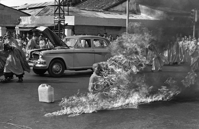 Thich Quang Duc, a Buddhist monk, burns himself to death to protest alleged persecution of Buddhists by the South Vietnamese government. This is the photograph that is more widely known today.