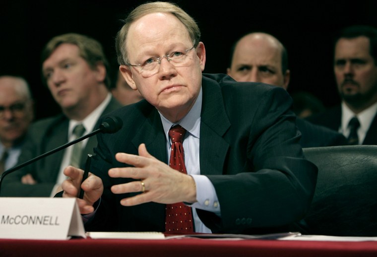 Former National Intelligence Director John McConnell, testifying before the Senate in 2007, is vice chairman of Booz Allen Hamilton.