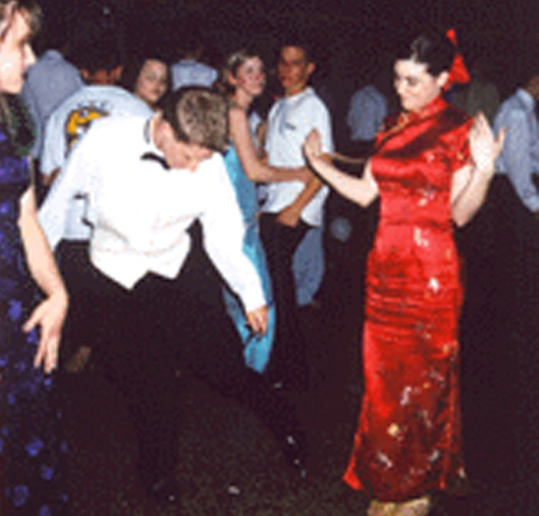 A picture shows Edward Snowden in 2002 dancing. The photograph was posted by a co-workerwhen he worked as a webmaster and editor for a Japanese anime company run by friends in Maryland.