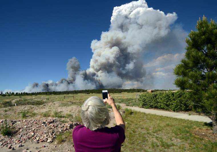 Marian Williams takes photos of the Black Forest Fire on June 11, 2013.