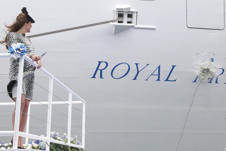 The Duchess of Cambridge names the Royal Princess with the traditional smashing of the champagne bottle.