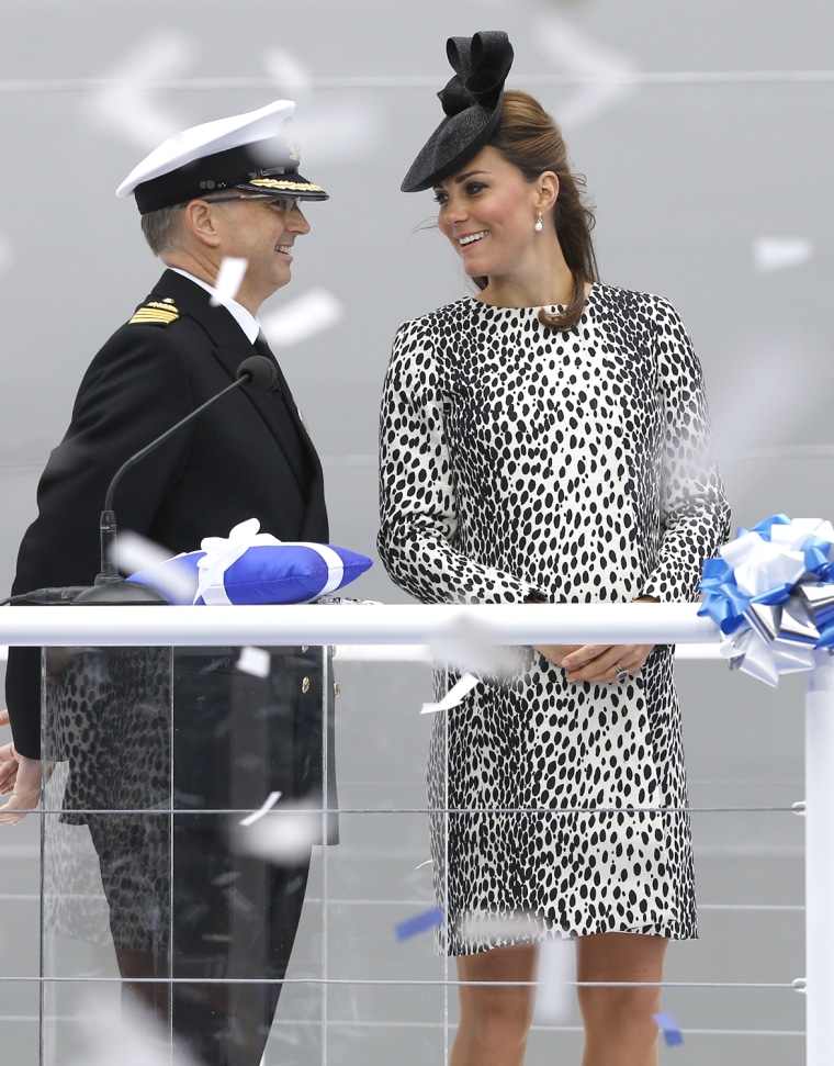 Britain's Kate, the Duchess of Cambridge smiles at Captain Tony Draper during a naming ceremony for the 'Royal Princess' cruise ship in Southampton, E...