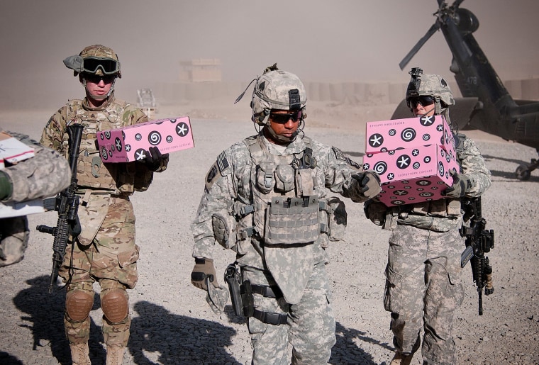 Boxes from Georgetown Cupcake, marked \"delicious but delicate,\" make their way to bases and remote areas in conflict zones.