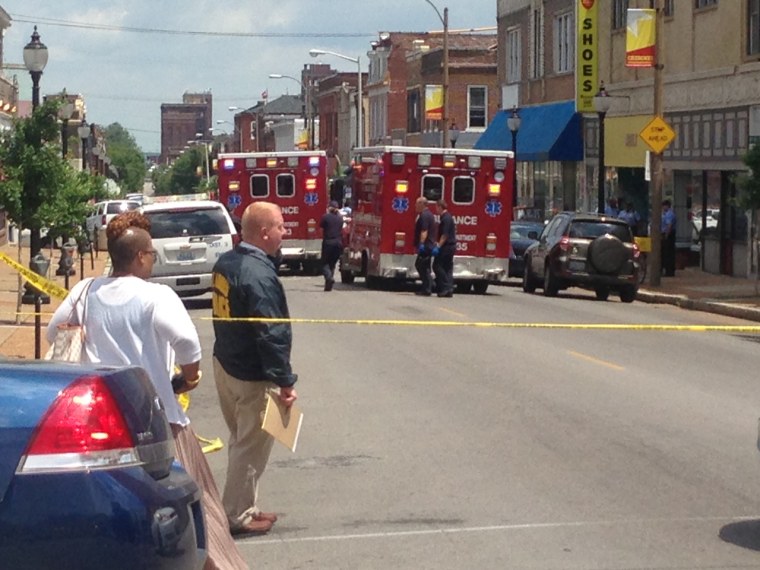 Police respond to a fatal shooting Thursday, June 13, on Cherokee Street in St. Louis.