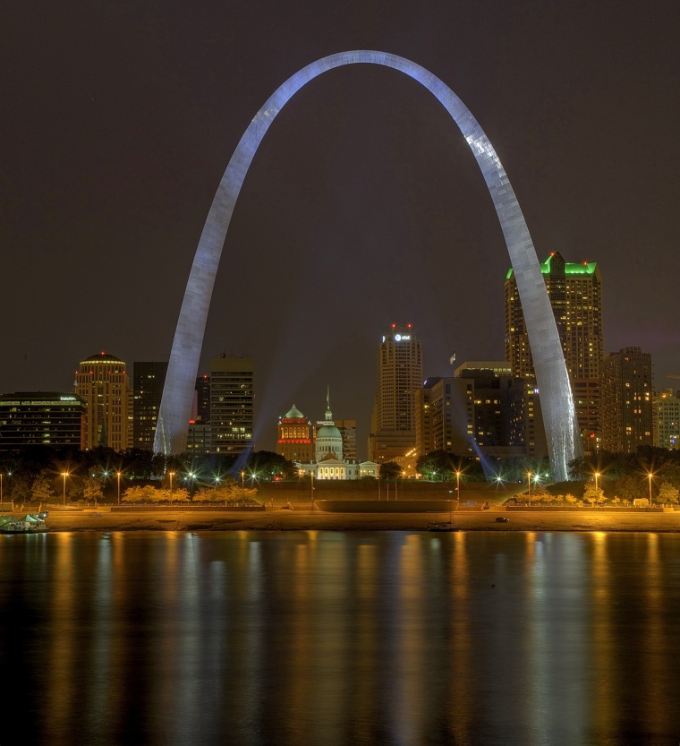 A vertical high dynamic range image of St. Louis and the Gateway Arch reflected in the Mississippi River, Mississippi, United States. (Photo by: MyLou...