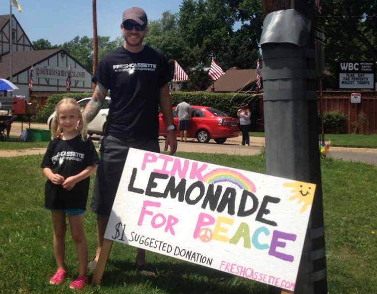 Jayden Sink, 5, and her father, Jon Sink, set up a lemonade stand at Equality House on Friday, across the Street from Westboro Baptist Church. The money she raised will go to the organization that founded Equality House, Planting Peace.