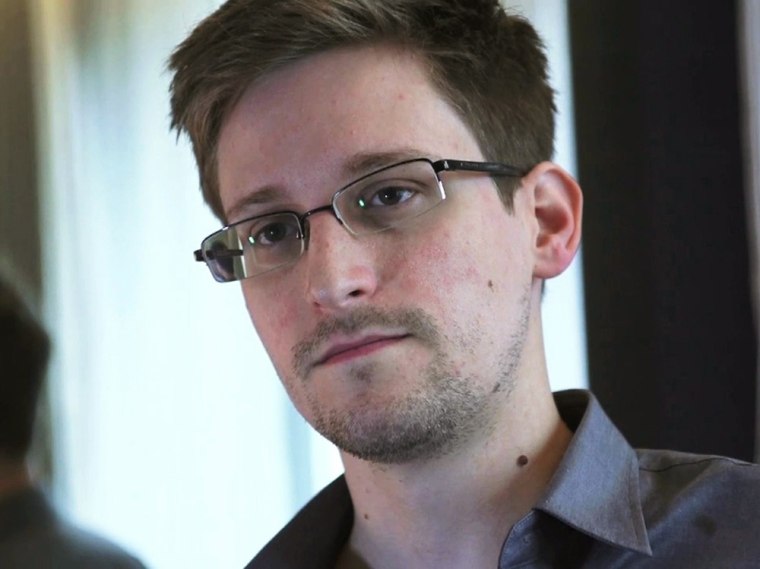 NSA whistleblower Edward Snowden, an analyst with a U.S. defense contractor, is seen in this still image taken from video during an interview by The Guardian in his hotel room in Hong Kong June 6, 2013. Snowden, an American who has leaked details of top-secret U.S. surveillance programmes, is technically free to leave the China-ruled city at any time, local lawyers said on June 12, but the ex-CIA employee said he would stay.