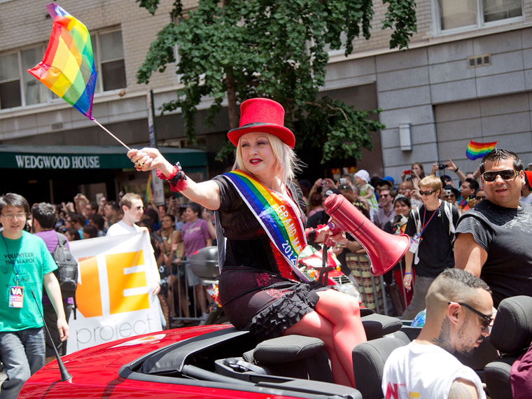 NEW YORK, NY - JUNE 24: Musician Cyndi Lauper takes part in the 2012 Gay Pride Parade in New York City on June 24, 2012. She is also taping her show C...