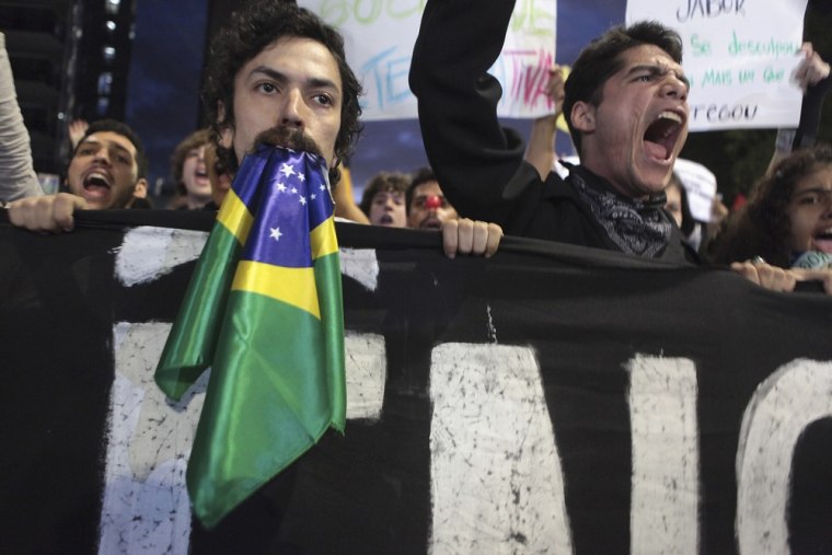 Demonstrators shout anti-government slogans during one of many protests around Brazil's major cities in Sao Paulo June 17, 2013.