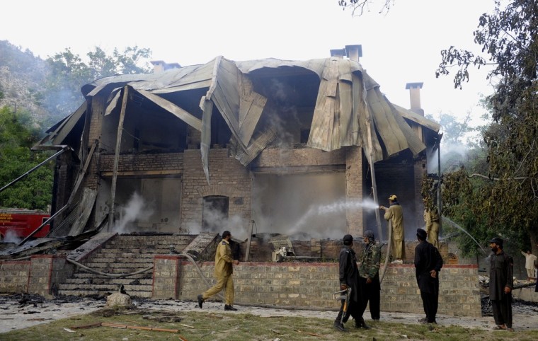 Pakistani firefighters extinguish a blaze which gutted a historical building in Ziarat, about 50 miles southeast of Quetta, on Saturday. The country's founding father Mohammad Ali Jinnah spent his last days in the building, which was declared a national monument following his death, one year after Pakistan's independence in 1947.