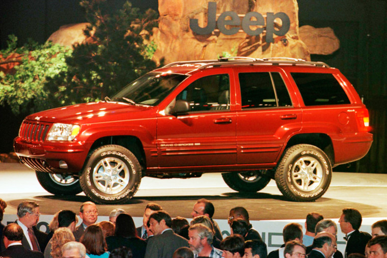 Chrysler introduced the all-new 1999 Jeep Grand Cherokee in Detroit's Cobo Center in Detroit, Michigan in this June 16, 1998, file photo. Chrysler Gro...