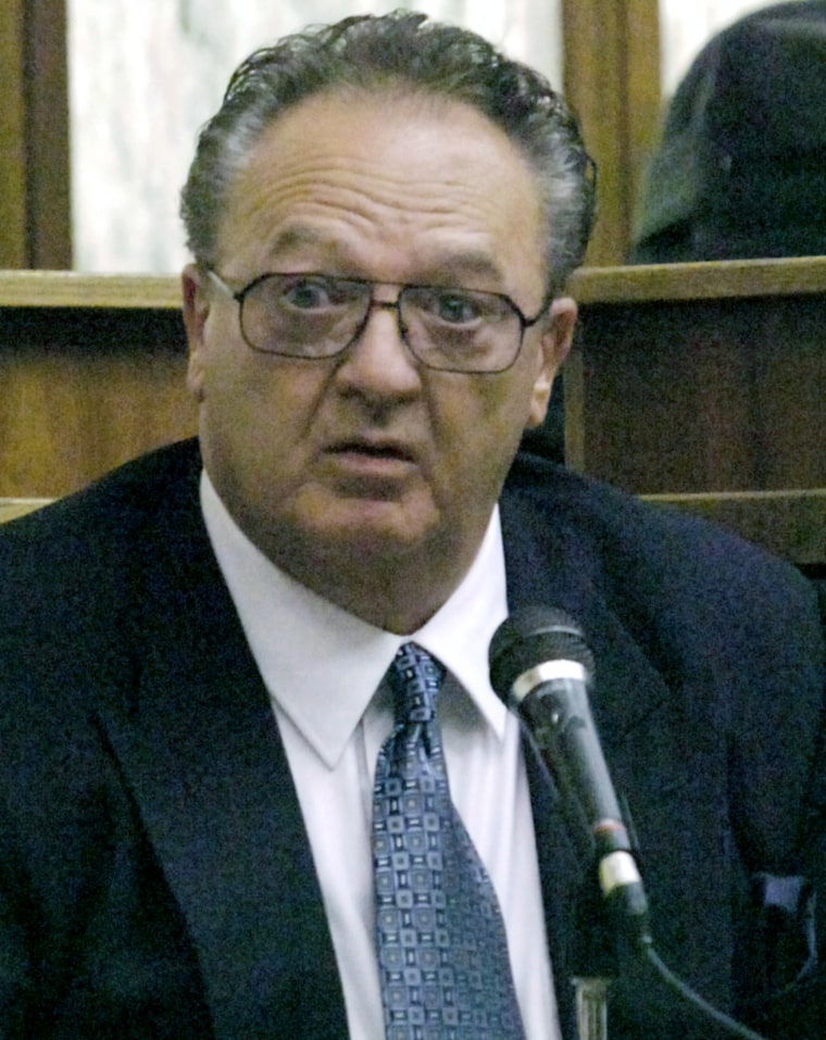 In this Sept. 17, 2008 file photo, John Martorano is questioned about his plea agreement in exchange for testifying against former FBI agent John Connolly, in the Miami Courthouse.